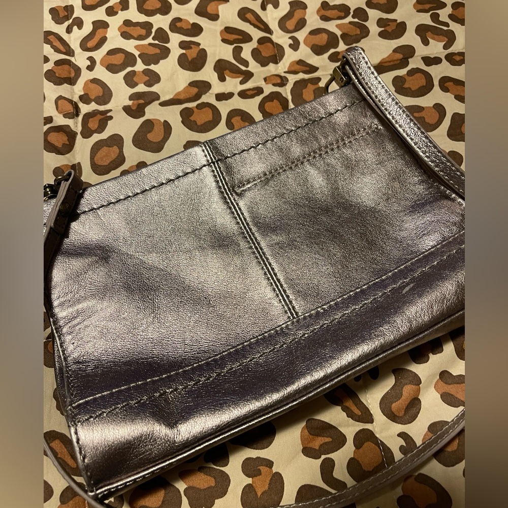 The Sak crossbody bag genuine silver metallic leather new never used